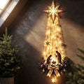 Estrella de Belén iluminada con escena de la Natividad y luces cálidas